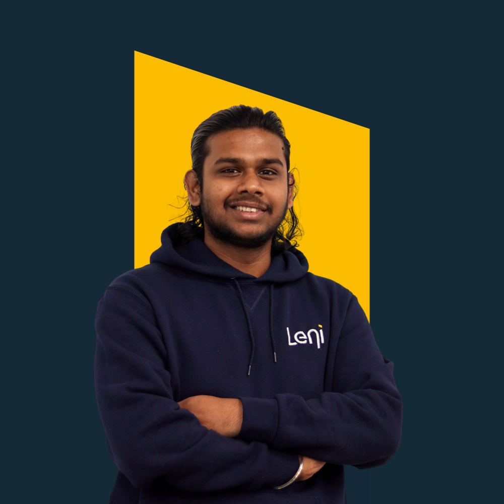 Vinayak, AI & Machine Learning Engineer at Leni, in branded hoodie against yellow background.