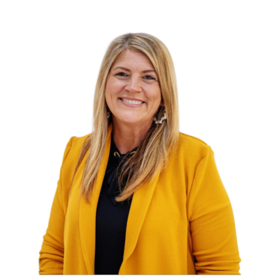 Portrait of Amy from Friedman Real Estate smiling in a yellow blazer